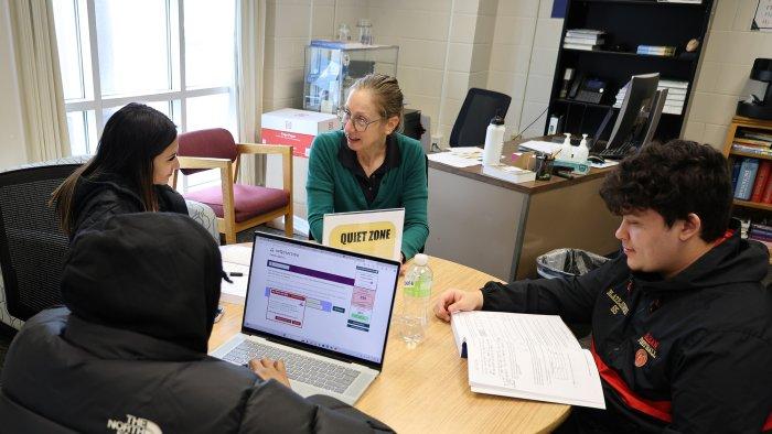 Alfred State students work in the math lab with a mathematics support specialist