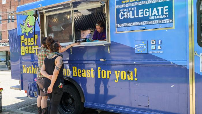 Customers place an order at the Collegiate
