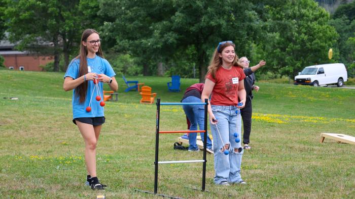 New friends playing ladder ball at Orientation
