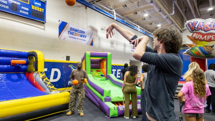Student tests his basketball skills
