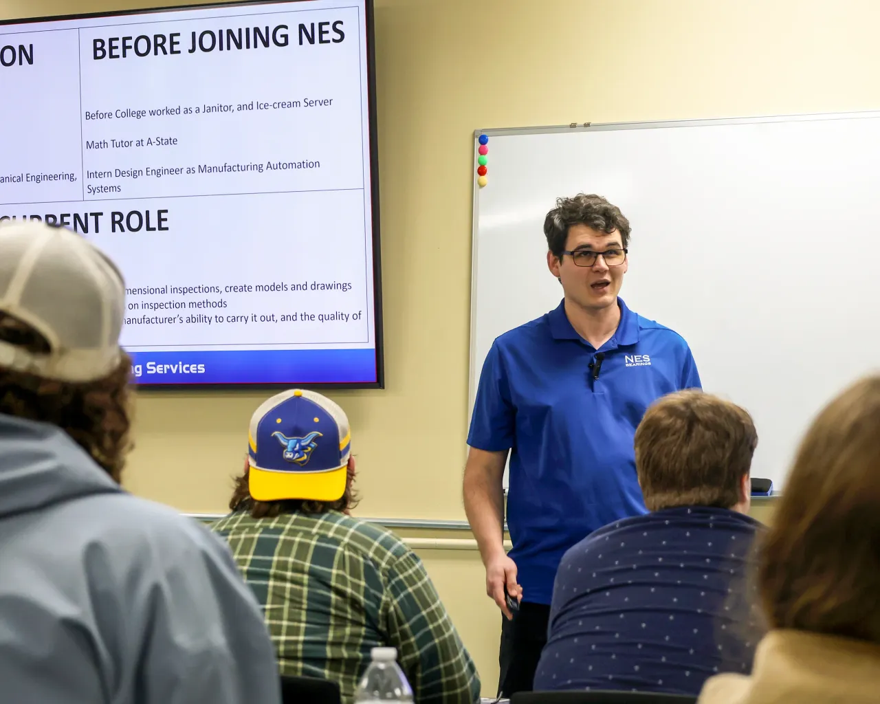Napoleon employee telling his story while at Alfred State College.