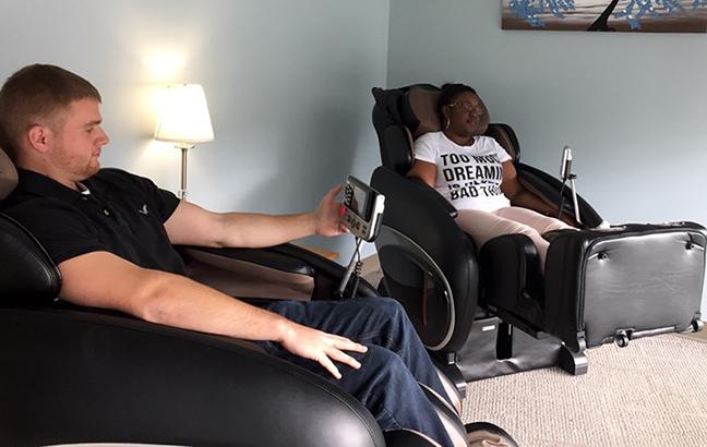 Students use massage chairs