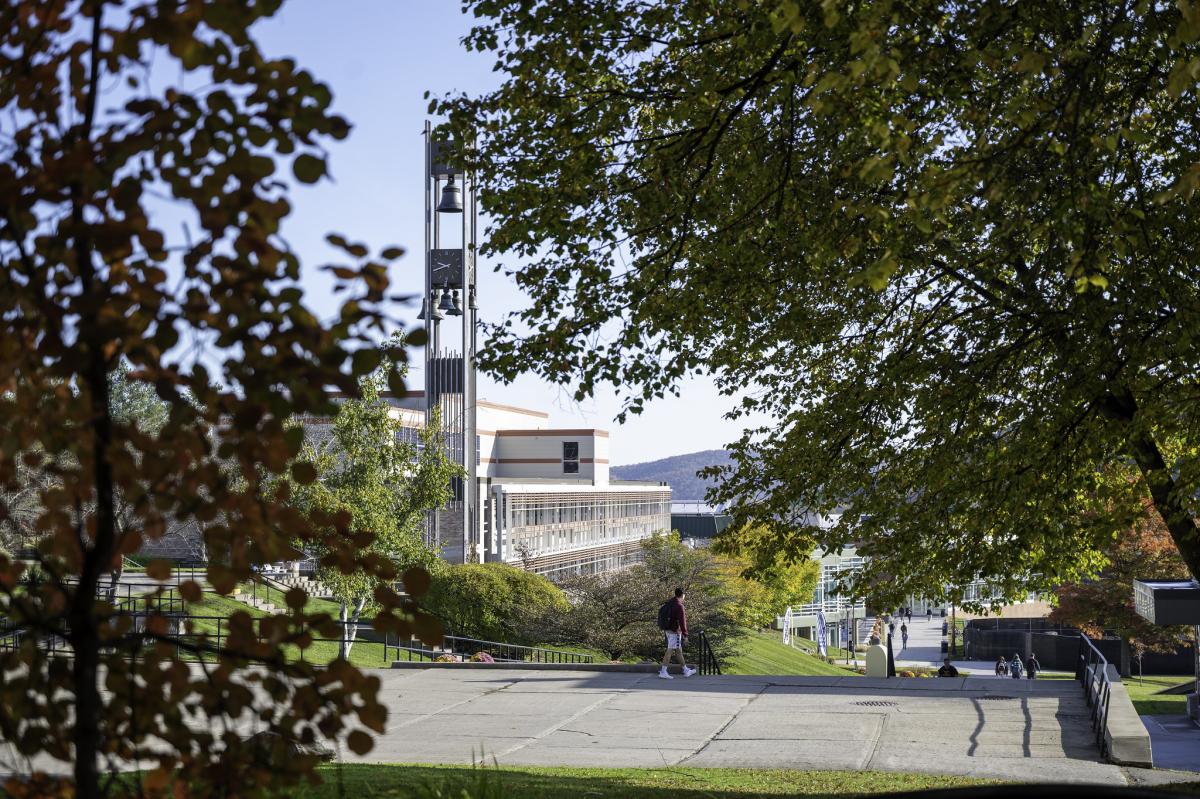 Hinkle Bell Tower through the trees near the Engineering Science Building
