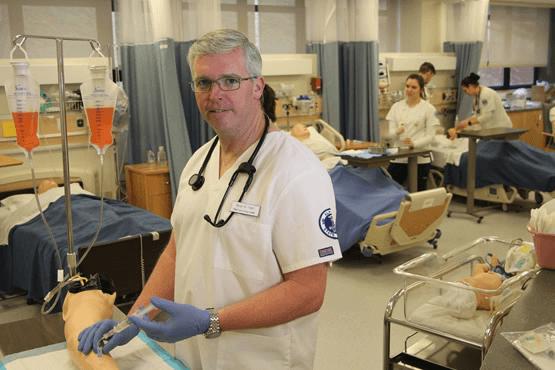 male student in a nursing lab