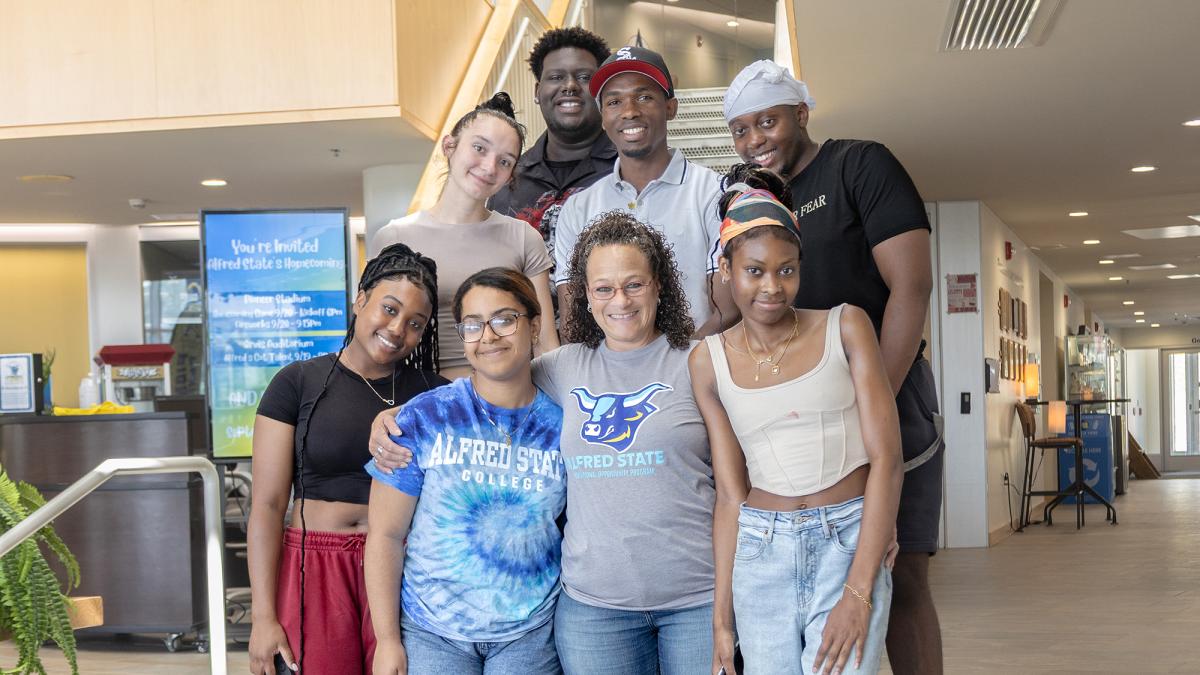 Students pose with EOP Director Nadine Shardlow