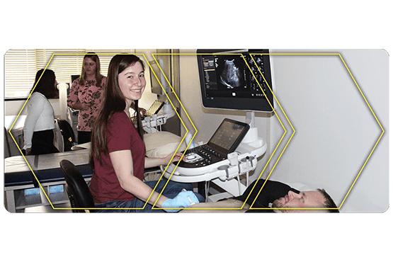 Madison in lab with ultrasound machine