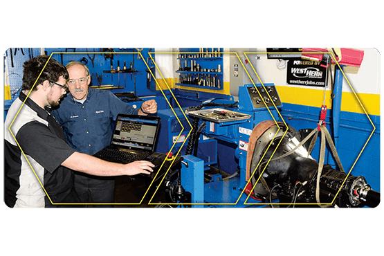 Mike Ronan with a student in the lab