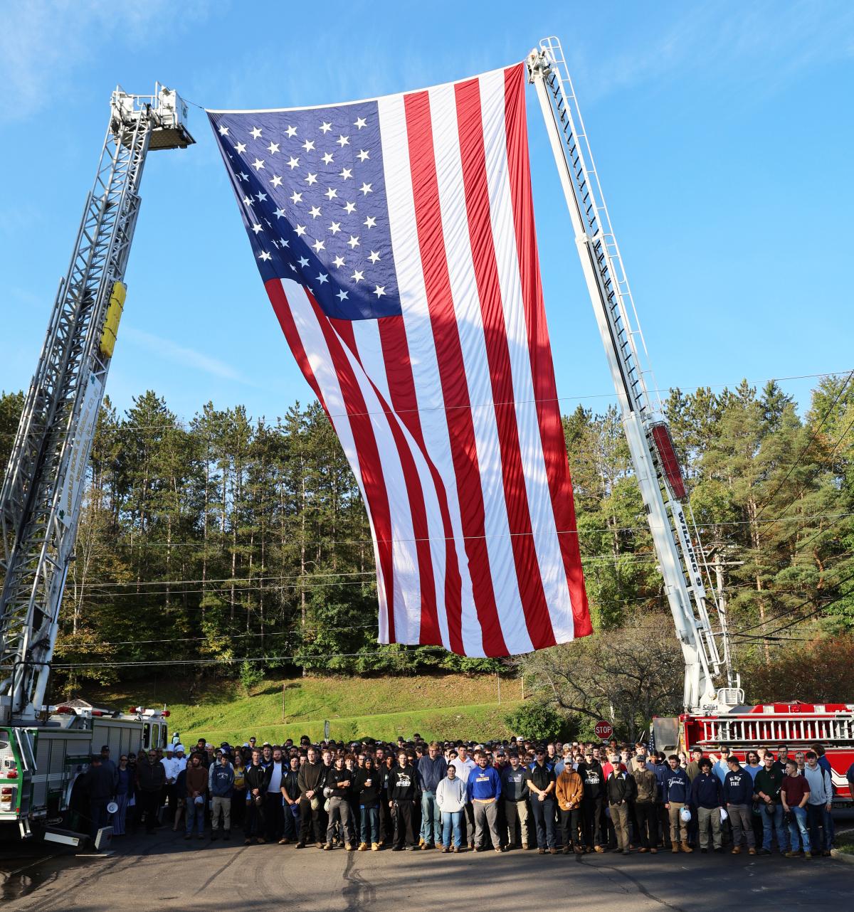 Large flag on the Wellsville campus