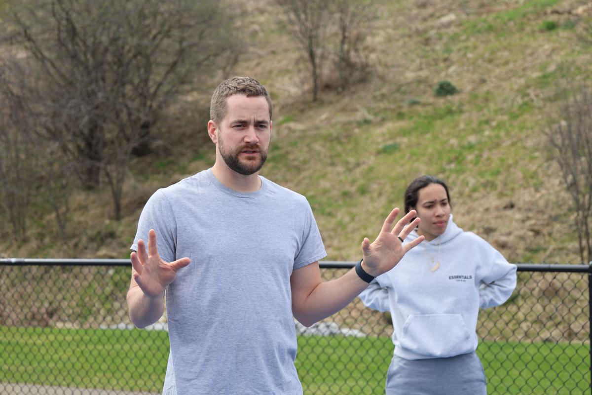 Officer Histed talks with students
