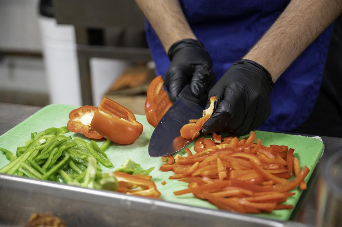 student works in the kitchen