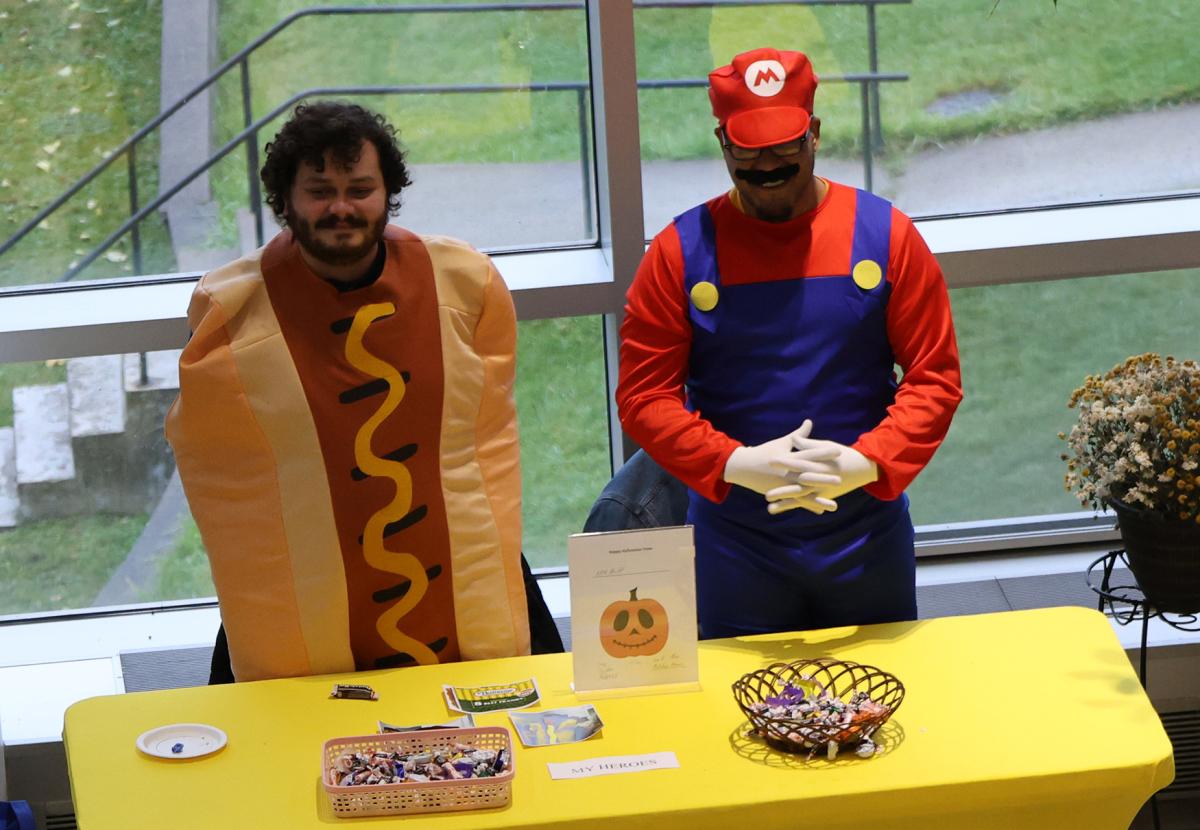 Pair of students at a community Halloween event