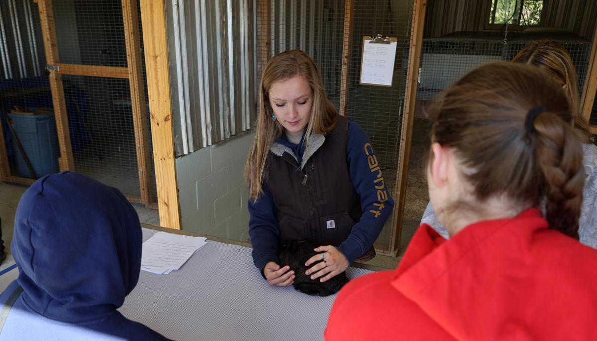 student shows off a bunny