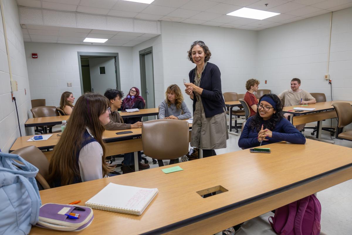 Teacher interacting with students in class