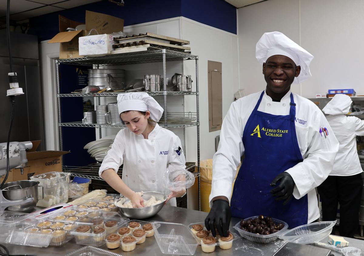 Student works in a baking lab
