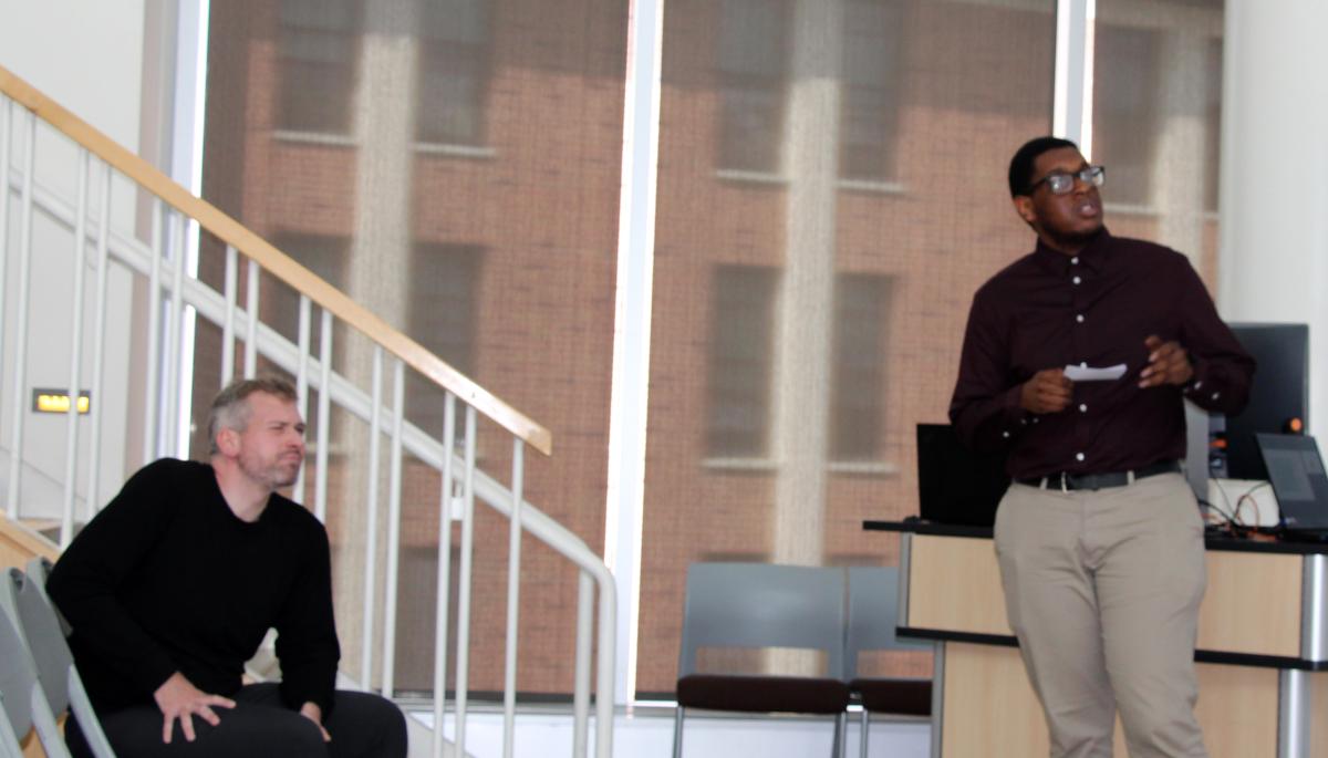 Professor Kevin Hofmann observes a presentation