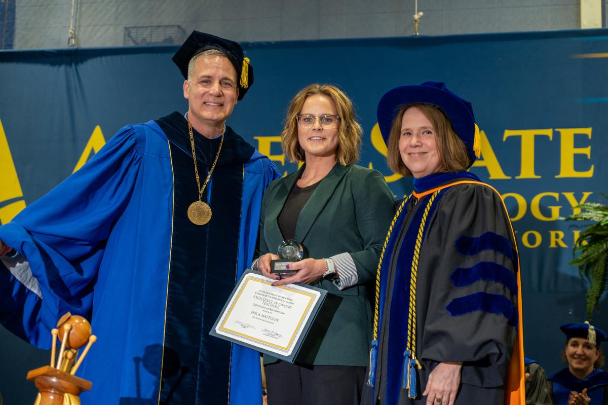 Erica Matteson presented an award