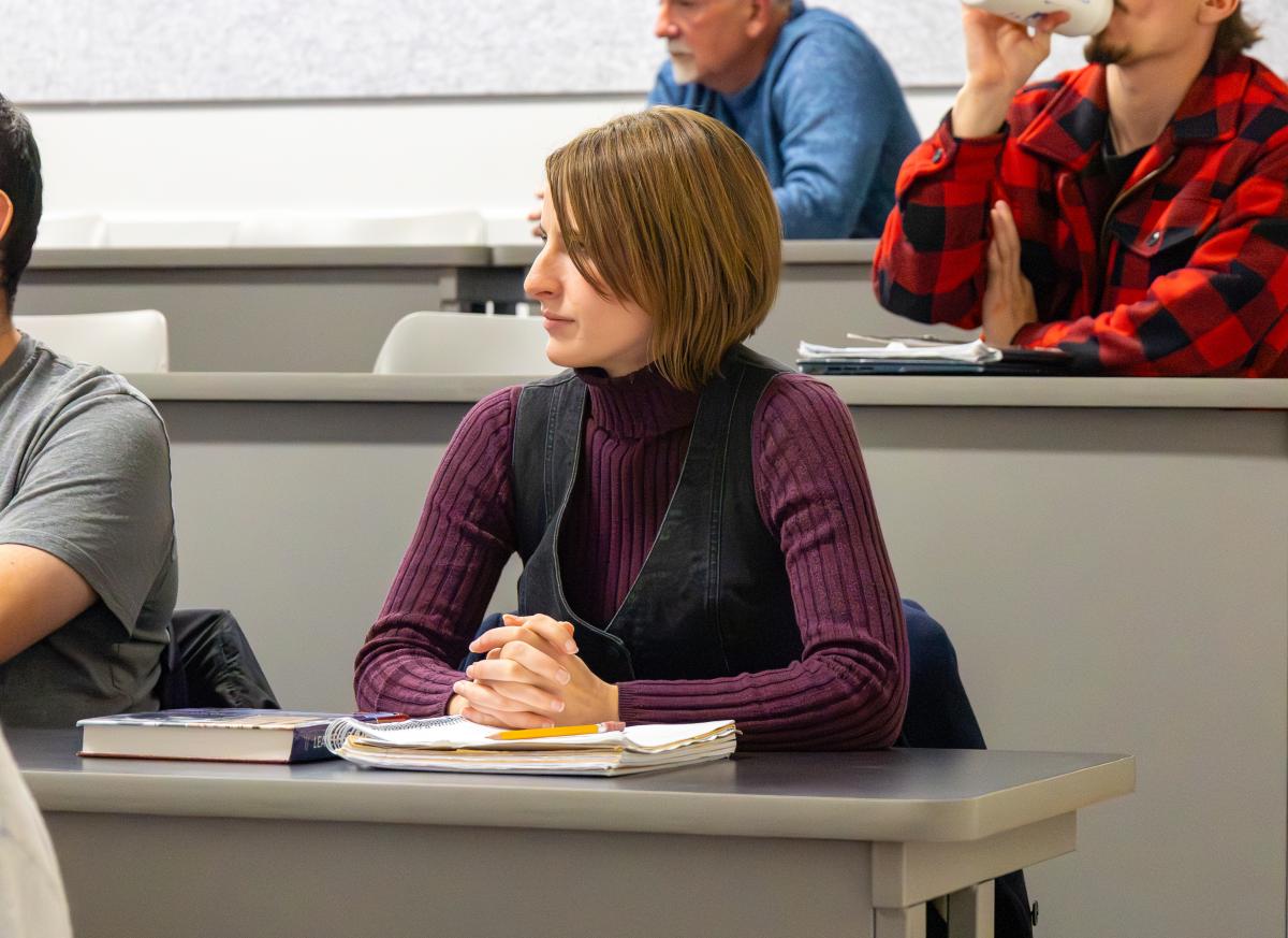 student looks on in a class