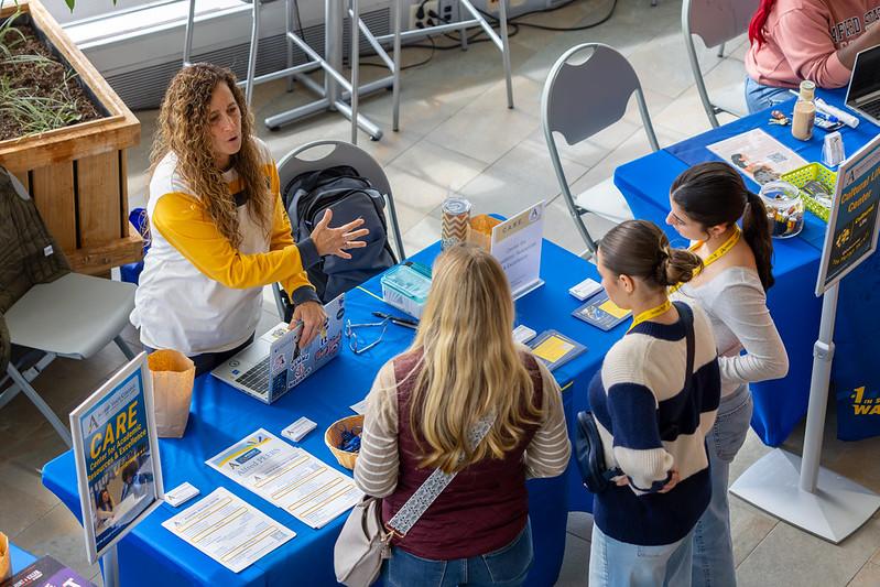 students talk to a member of the student success center