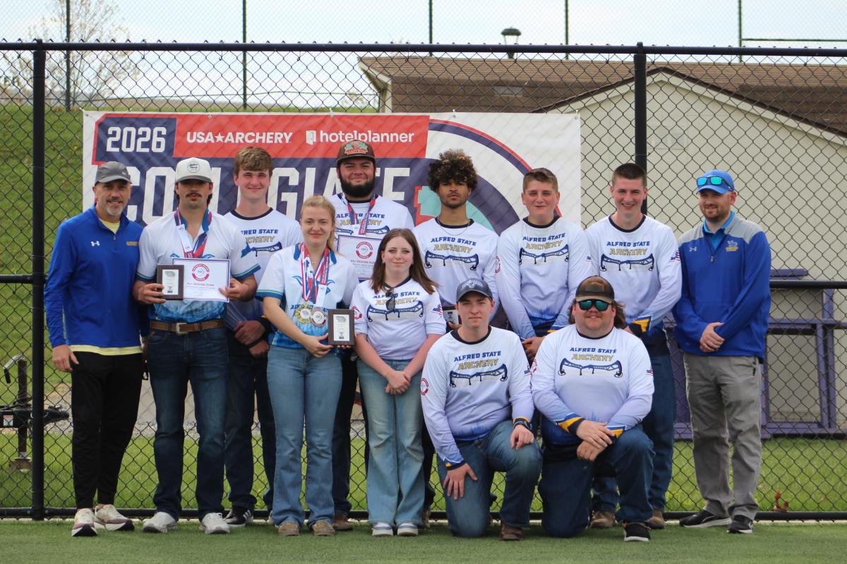 Team photo of the archery team after competition in Virginia.