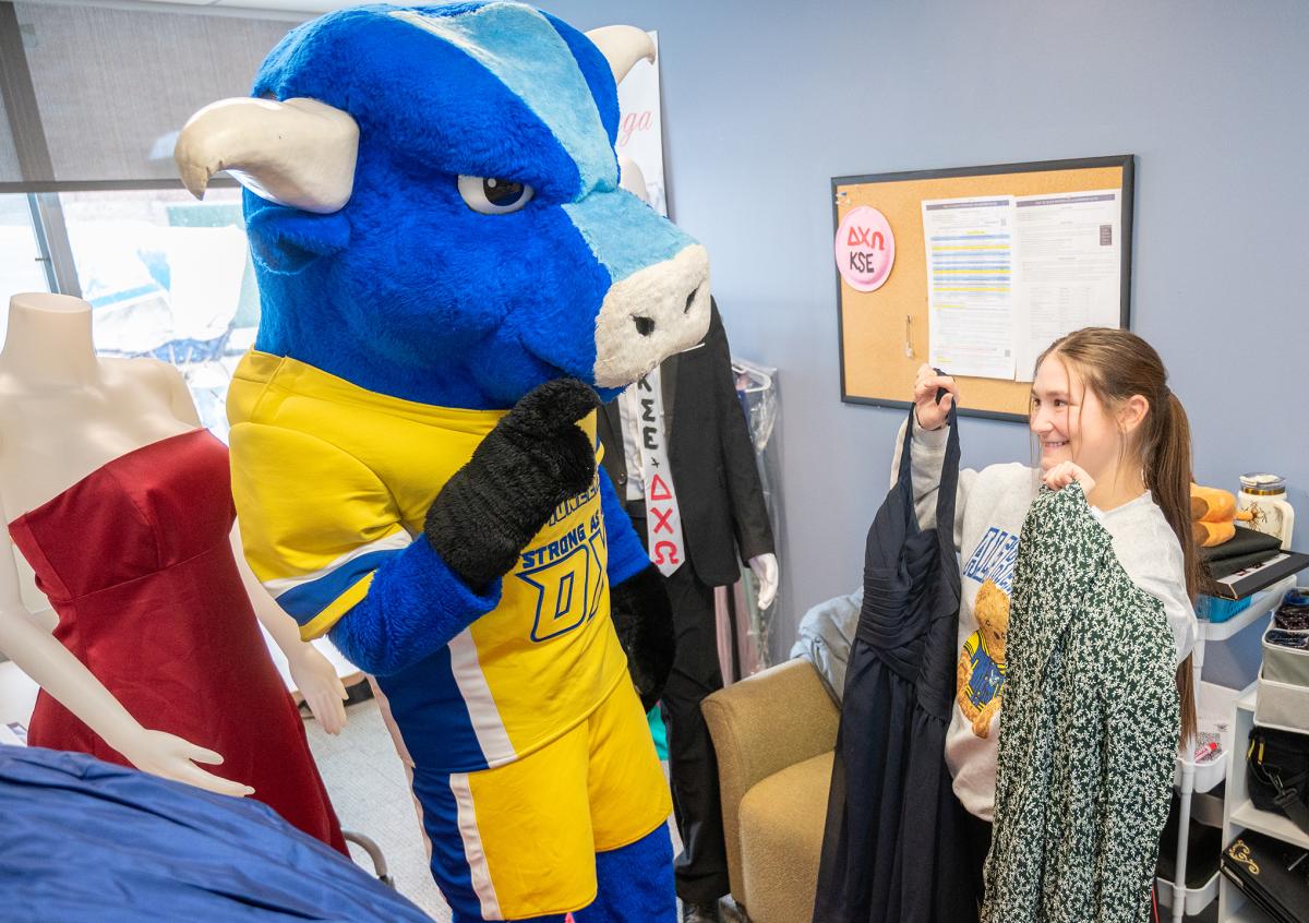 Big Blue checks out some dresses from Project Prom Dress