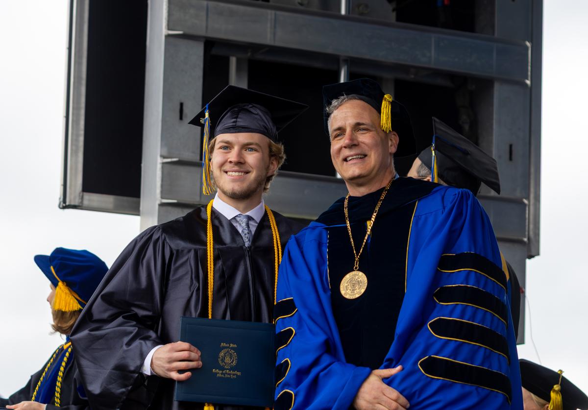 student receives his diploma