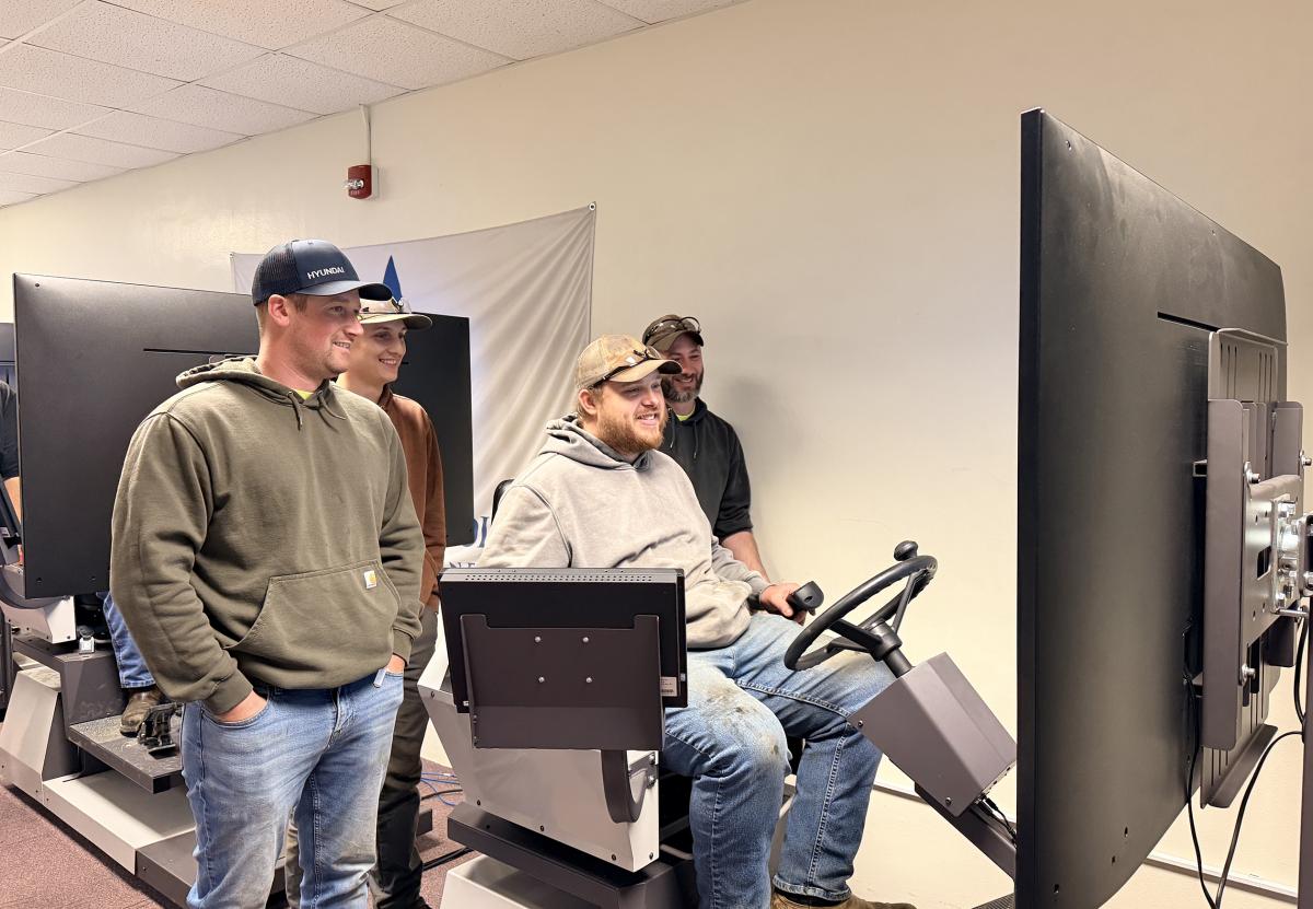 microcredential students work on simulators