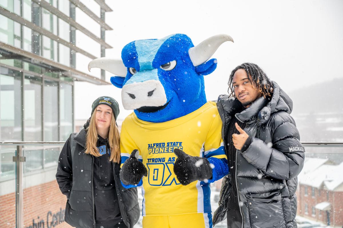 Big Blue in the snow with students