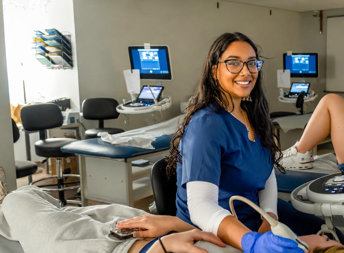 Student works in a sonography lab.