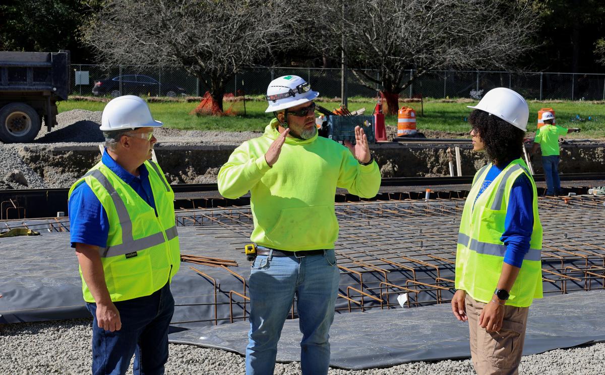Alum gives tour of construction at Truck & Diesel