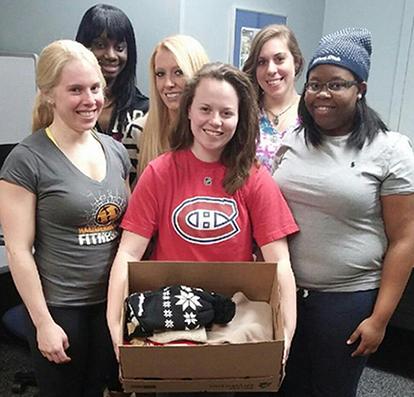 2014 Alfred State Court Reporting Students Prepare Care Packages