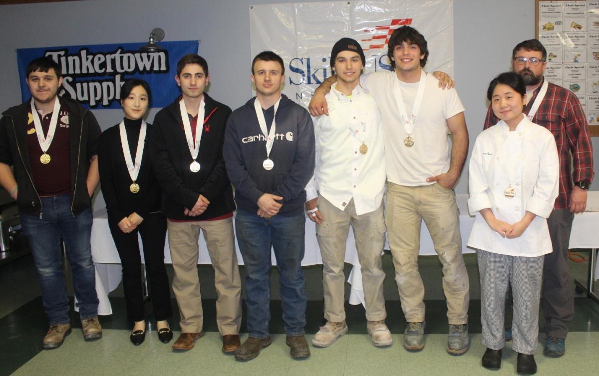 Skills USA Postsecondary Championship Gold medal winners – Left to Right:  Alexander Bieber, Chris Lee, Jared Coffin, Lucas Miranda, Jared George, Sean Malenfant, Dahyun Nam, and Larry Knoll.