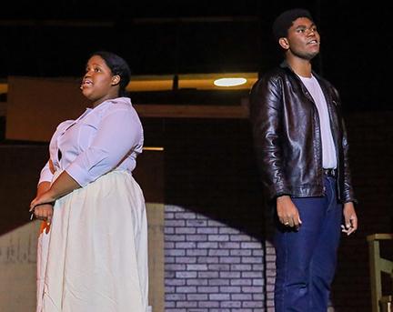 Members of the drama club perform at a past production.