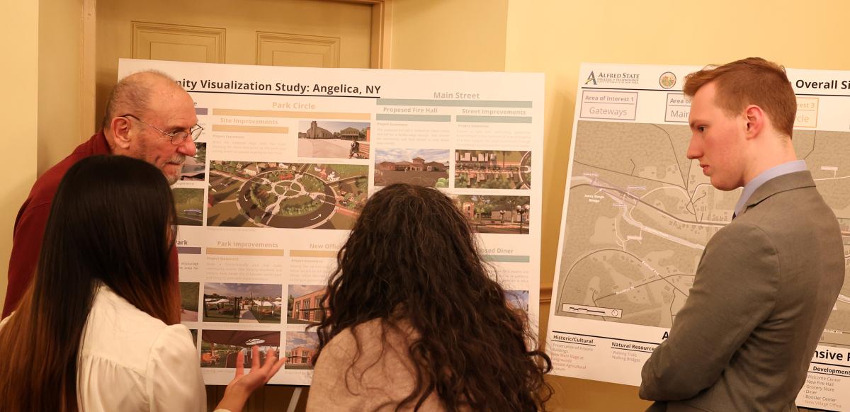 students speak with locals after making an architecture presentation