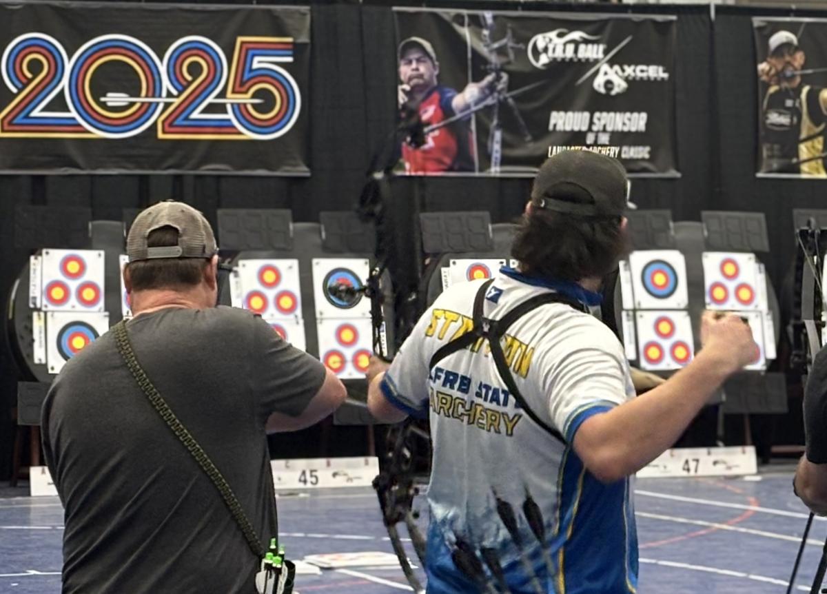 student shoots an arrow