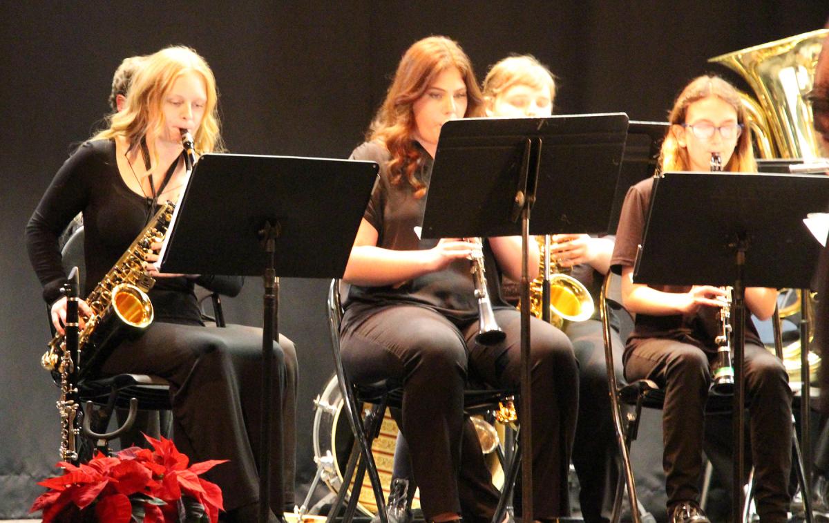 Band members play at a recent concert