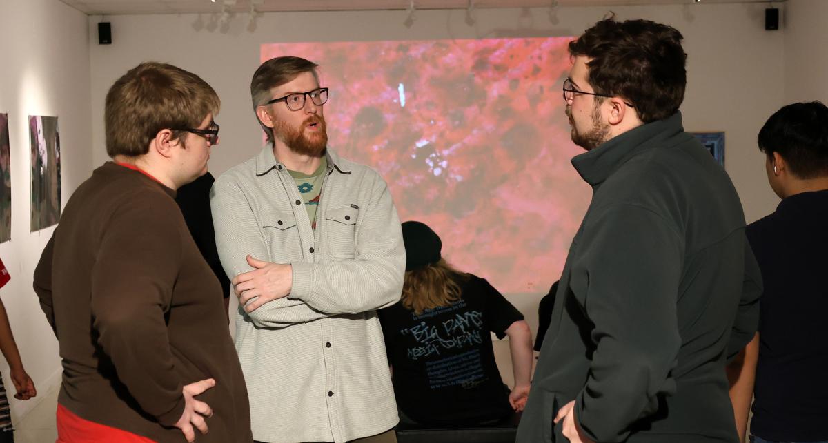 Blake Barit speaks with students