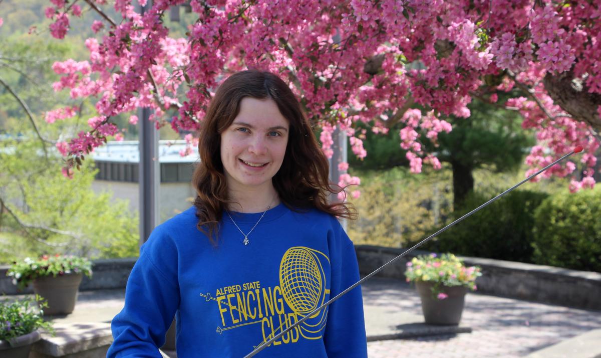 Amanda Brady stands in bell tower plaza