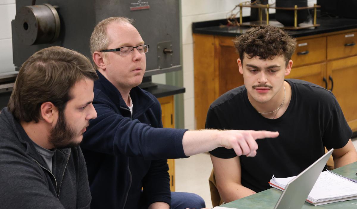 Professor Bryant works with students