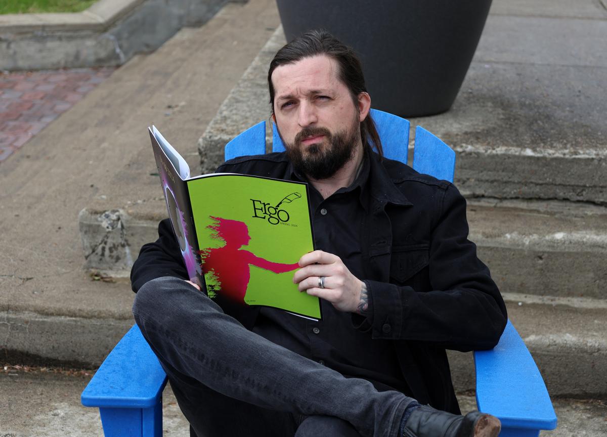 Student reading magazine