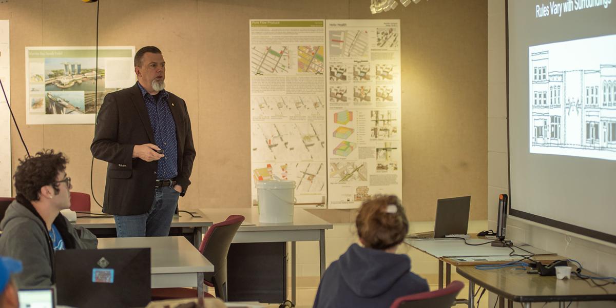 William Dean teaches a class