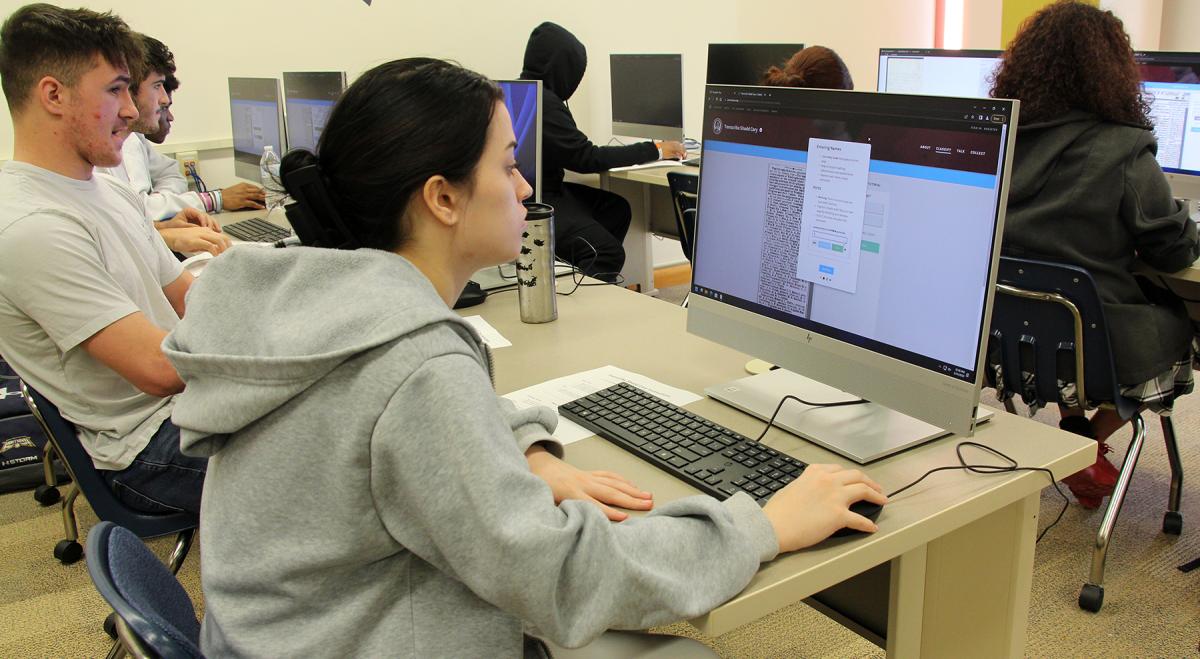 Alfred State students transcribe works by Mary Ann Shadd Cary in the Hinkle Library during the college’s Frederick Douglass day celebration.