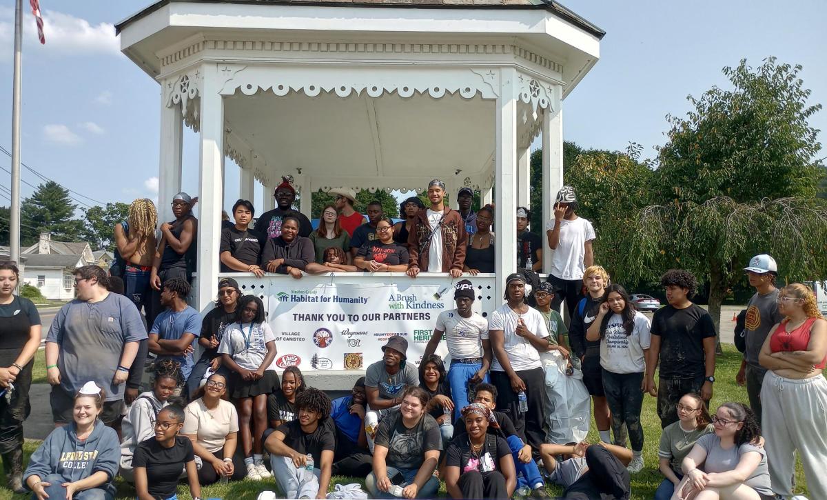 students in front of a gazebo