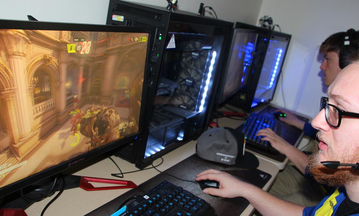 student playing games on computer