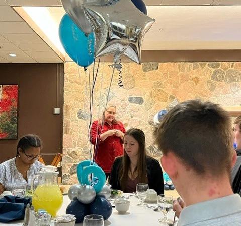 Students at the etiquette dinner
