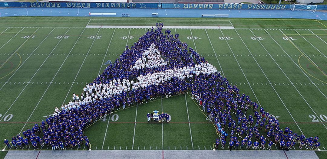 Alfred State first-year students make their first “A” at Pioneer Stadium prior to the start of the Fall 2022 semester. This picture was the most shared picture of 2022.