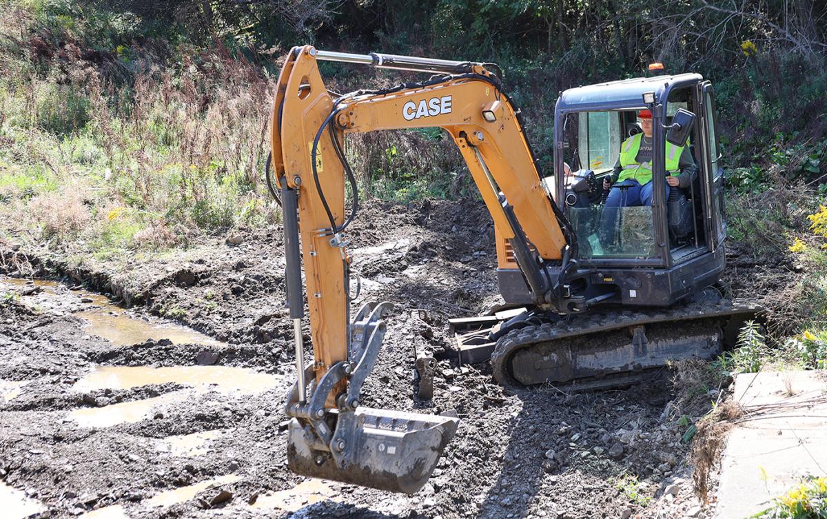 student driving heavy equipment
