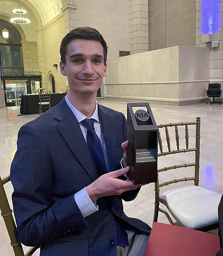 Alec Harrigan with his Student Project Award.