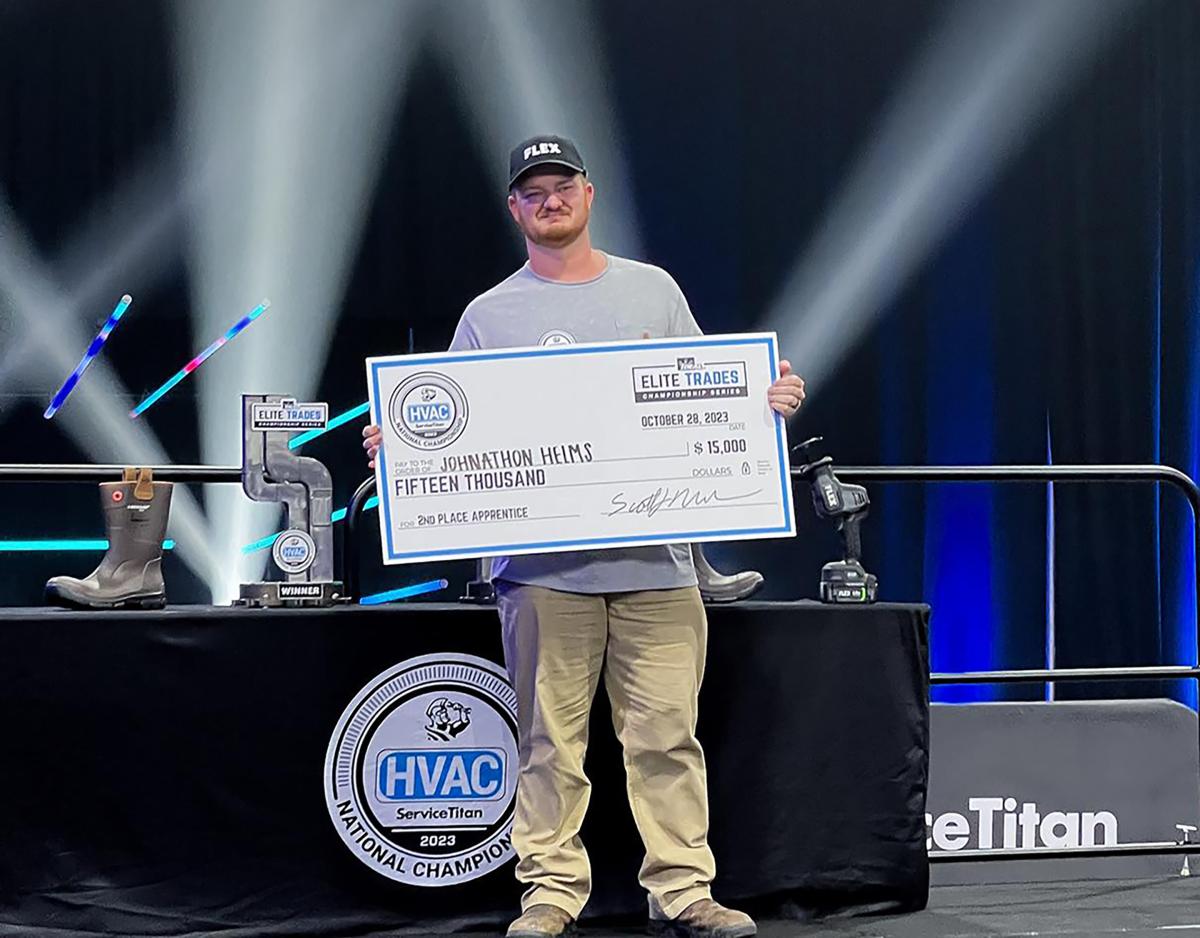 Johnathon Helms with his prize check