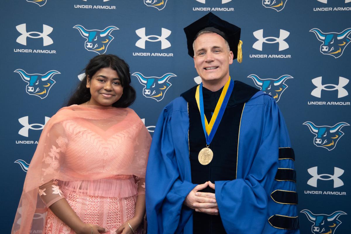 Alfred State Student Senate President Soumya Konar poses with President Dr. Steven Mauro prior to Honors Convocation.