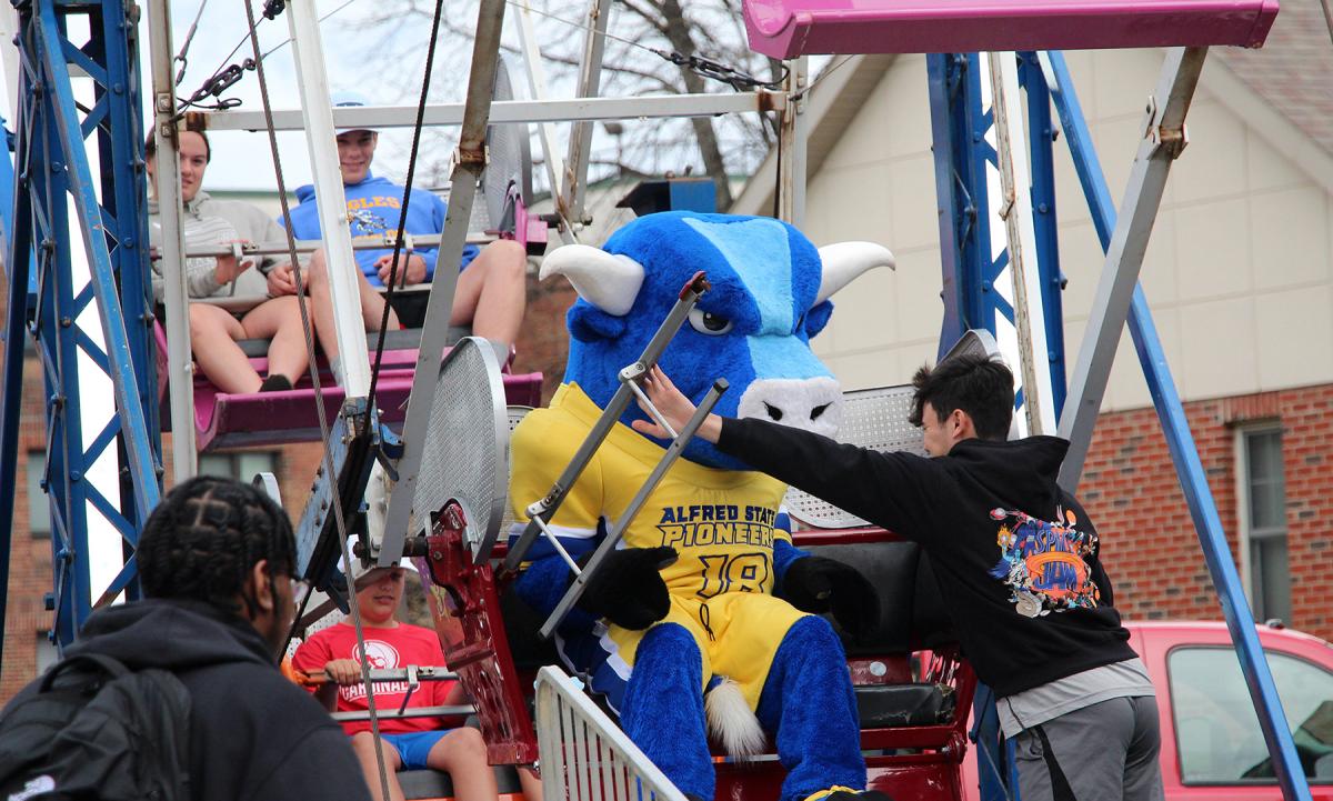 Big Blue rides a Ferris wheel